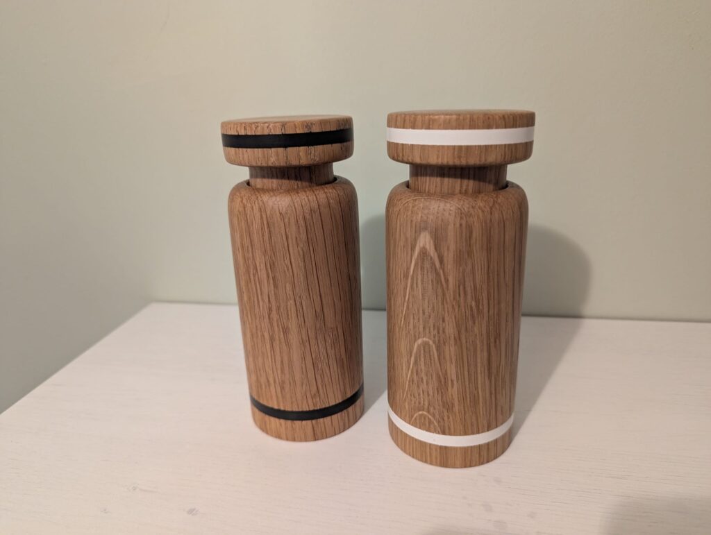 A set of wooden salt and pepper grinders